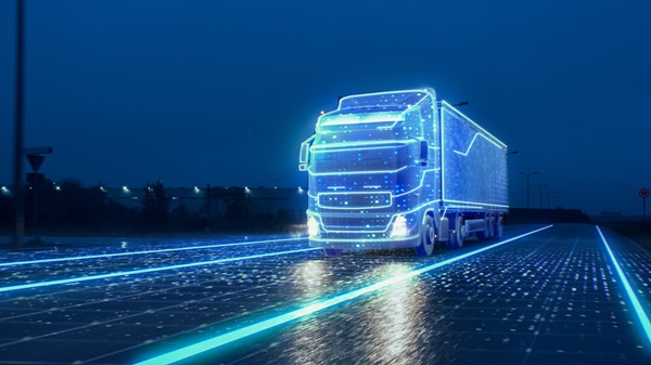 Autonomous semi-truck with cargo trailer drives at Night on the Road with Sensors Scanning Surrounding